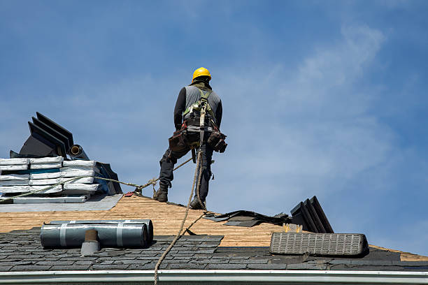 Professional Roof Replacement technician working in Benedict, NE
